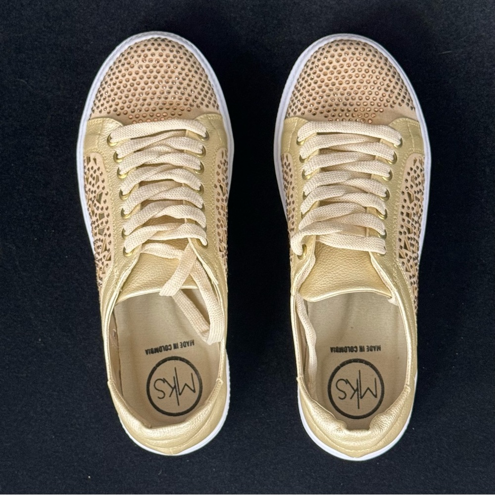 Gold lace-up sneakers/shoes with cute geometric cut-outs on the sides